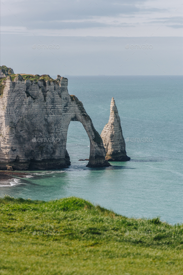 background landscape with cliffs and blue sea, Etretat, Normandy ...