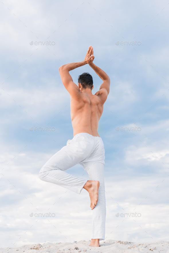 Man Paracticing Yoga In Balancing Stick Pose ~ Clip Art #133948895