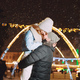 Young couple outdoor in night street at christmas time - PhotoDune Item for Sale