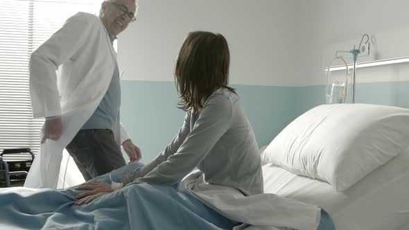Doctor comforting a patient at the hospital