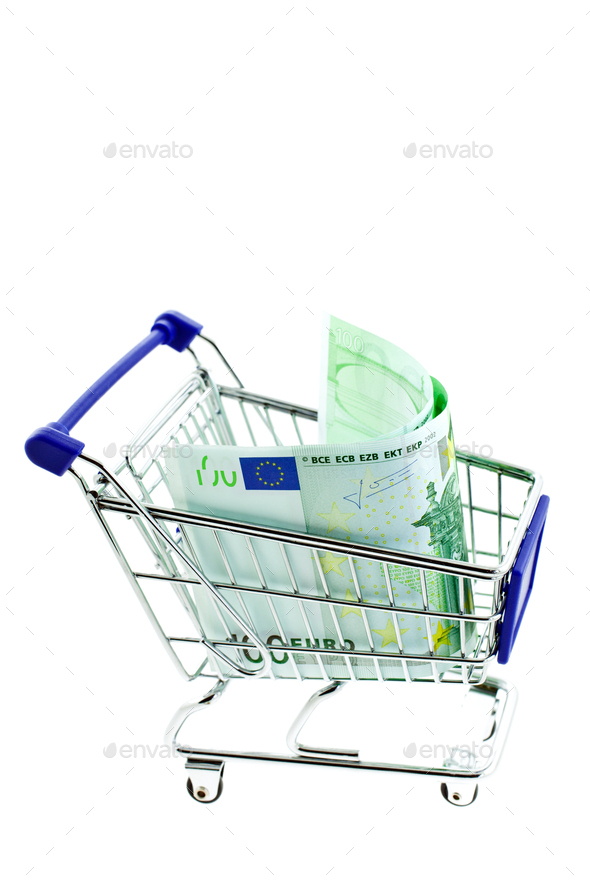 shopping trolley with 100 euro notes isolated - Stock Photo - Images