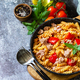 Healthy lunch. Fusilli pasta with canned tuna, grilled red peppers and tomatoes in frying pan.  - PhotoDune Item for Sale