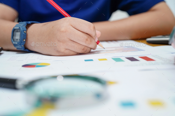 Children or kid calculate mathematics with pencil about math with graph. - Stock Photo - Images