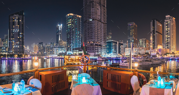 Night Walk On Tourist Boat, Sightseeing Boat Sailing On Dubai Marina. Night View Of Dubai Marina - Stock Photo - Images