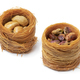 Traditional Syrian cookies stuffed with nuts on white background - PhotoDune Item for Sale