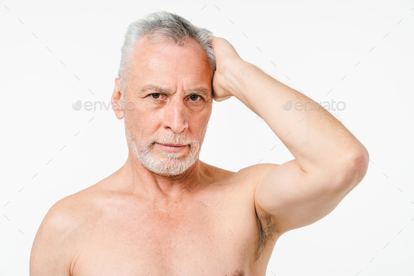 Handsome caucasian mature middle-aged senior naked man with grey hair