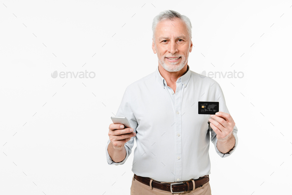 Caucasian senior middle-aged businessman grandfather freelancer using mobile banking e-commerce  - Stock Photo - Images
