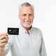 Mature caucasian senior businessman grandfather customer client holding credit card  - PhotoDune Item for Sale