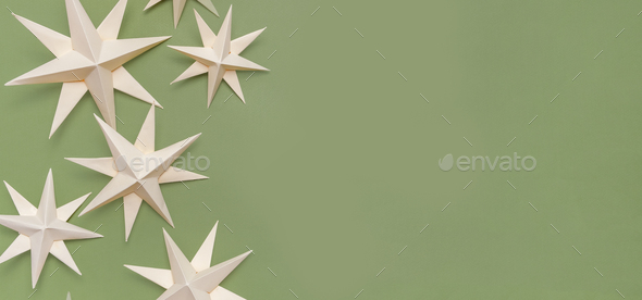 Merry Christmas.Christmas stars handmade light beige background.Monochrome,Christmas background,holi - Stock Photo - Images