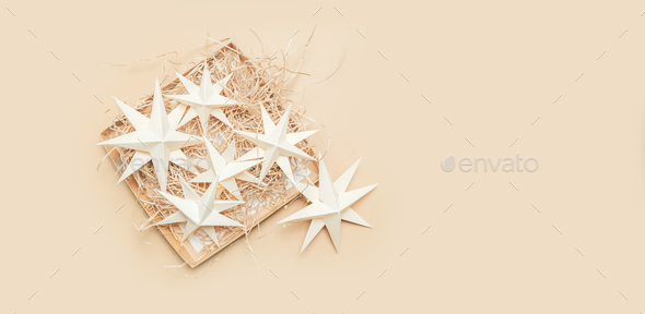Merry Christmas.Christmas stars handmade light beige background.Monochrome,Christmas background,holi - Stock Photo - Images