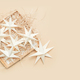 Merry Christmas.Christmas stars handmade light beige background.Monochrome,Christmas background,holi - PhotoDune Item for Sale