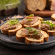 Bread sandwiches with jerky salted meat, sorrel and cilantro microgreen on black. selective focus. - PhotoDune Item for Sale