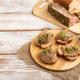 Bread sandwiches with jerky salted meat, sorrel and cilantro microgreen on white. copy space. - PhotoDune Item for Sale