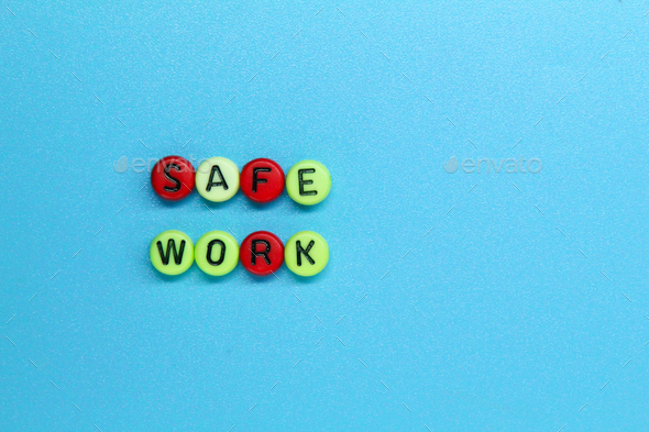letters in circles with the word safe work. the concept of safety at work