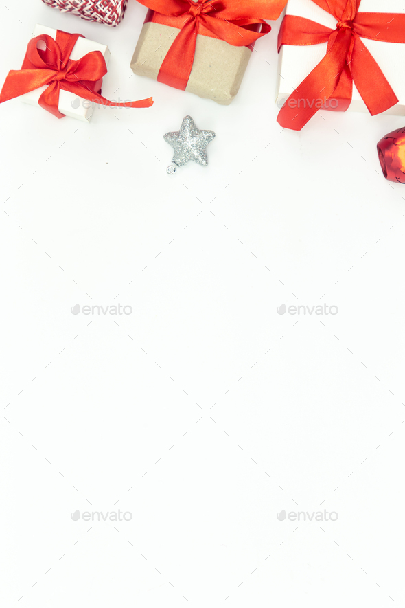 White Christmas background with gifts and holiday decor details, flat