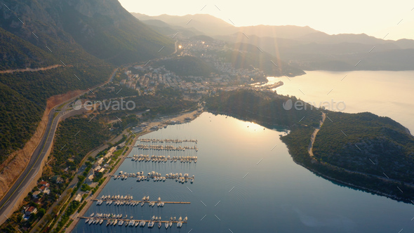 Aerial view of sea bay with parked yachts and boats in the morning. - Stock Photo - Images
