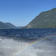 Rainbow in the water spray of Lake Teletskoye in sunny day. Altai, Russia. - PhotoDune Item for Sale
