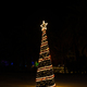 Christmas tree with light garlands at night - PhotoDune Item for Sale