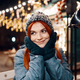 Women enjoy winter holiday lights in the evening - PhotoDune Item for Sale