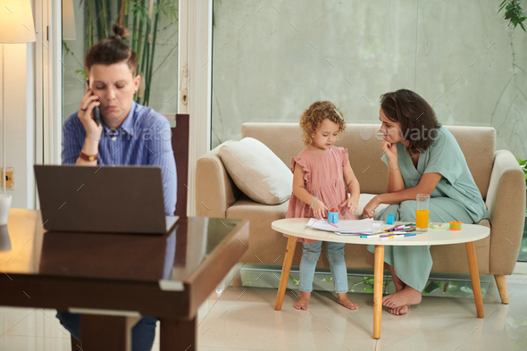 Woman Playing with Little Daughter - Stock Photo - Images