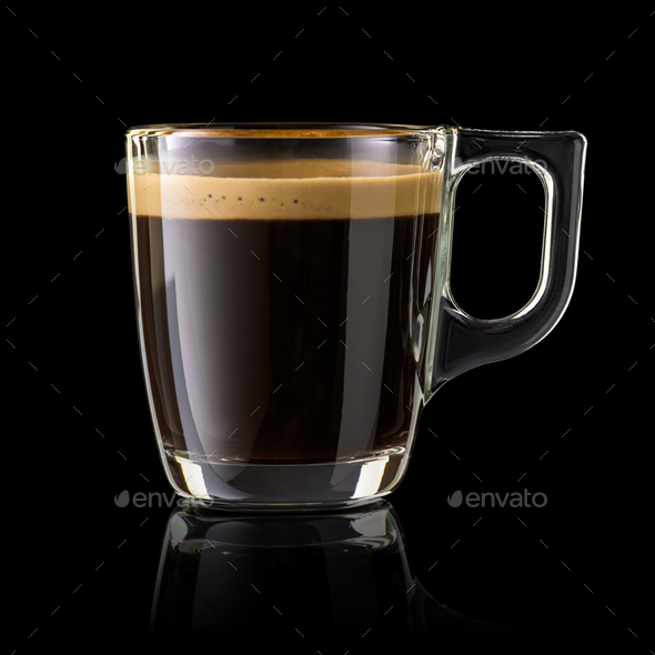 Glass cup of espresso coffee isolated on black. - Stock Photo - Images