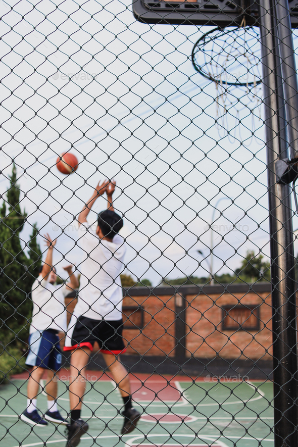 Playing basketball outdoor
