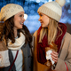 Happy woman friends enjoying time together on christmas market. People happiness concept - PhotoDune Item for Sale