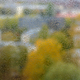 View to town through window glass with rain drops - PhotoDune Item for Sale