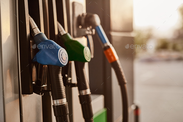 Hoses hanging on gas pump Stock Photo by kegfire | PhotoDune