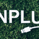 Word Unplug, white internet usb adapter on moss, green grass background. Biophilia concept - PhotoDune Item for Sale