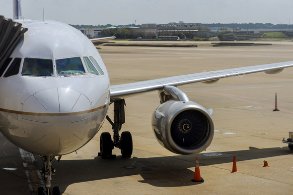 Front view of landed airplane in a terminal of at the John F. Kennedy ...