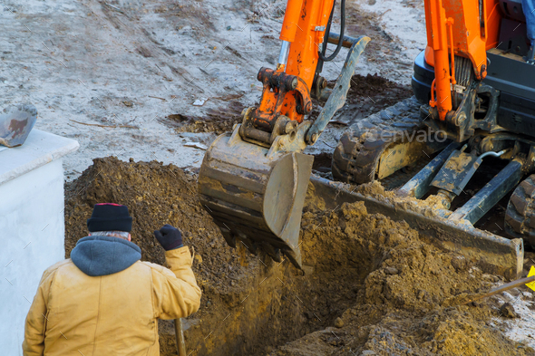 Outdoor work : Excavator digging to moving the soil in construction excavation work