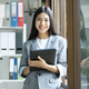 Young asian businesswoman working at office using laptop. - PhotoDune Item for Sale