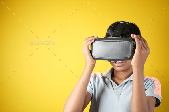  young man wearing virtual reality headset, vr box. - Stock Photo - Images