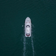 Aerial drone view of industrial tug assisting boat in deep sea - PhotoDune Item for Sale