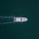 Aerial drone view of industrial tug assisting boat in deep sea - PhotoDune Item for Sale