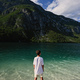 Back of boy stand in Lake Bohinj, the largest lake in Slovenia, part of Triglav National Park. - PhotoDune Item for Sale