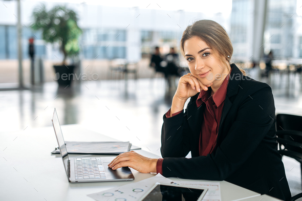 Photo of a gorgeous successful confident caucasian business woman, hr manager, broker, company