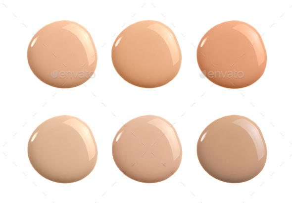 Liquid concealer cream smear smudge swatch drop isolated. Make up foundation shades sample round
