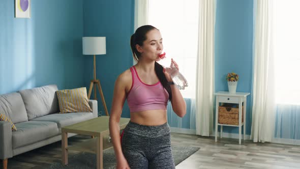 Portrait of Woman That Drinks Water alt