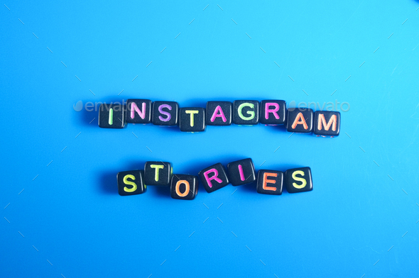small black cube with the word Instagram stories.  - Stock Photo - Images
