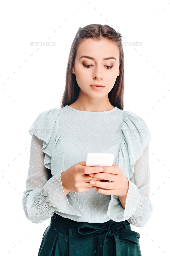 portrait of stylish woman using smartphone isolated on white - Stock Photo - Images