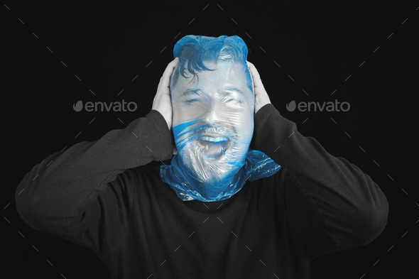 Blue garbage bag on man head. Exit bag for suicide. - Stock Photo - Images