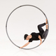 Male acrobat performing trick in hoop - PhotoDune Item for Sale