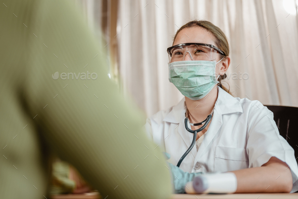 Doctor Consultation About Viral Fever With Patient At Hospital Stock   DSC 1393 