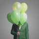 Businessman hiding behind balloons - PhotoDune Item for Sale