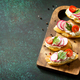 Brushetta or Crostini with Toasted Baguette,  Cheese, Radish and Tomatoes.   - PhotoDune Item for Sale