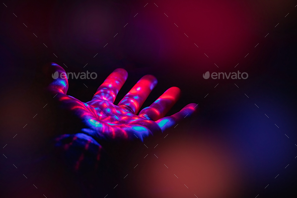 Colorfully Lit Hand - Stock Photo - Images