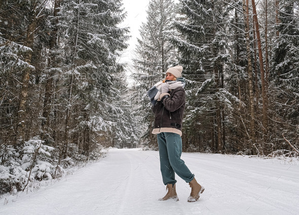 Winter.woman walks through winter snowy forest. Mental and physical health. Unity with nature.travel - Stock Photo - Images