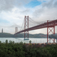 25 de Abril Bridge, Sanctuary of Christ the King skyline and Tagus River - Lisbon, Portugal - PhotoDune Item for Sale